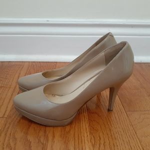 Nude patent pumps